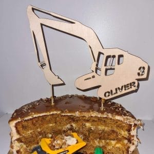 Puinen kakkukoriste - Kaivuri